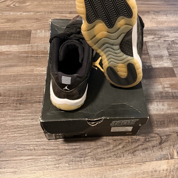 Jordan Retro Low Black, White, and Silver Sneakers - Picture 4 of 6